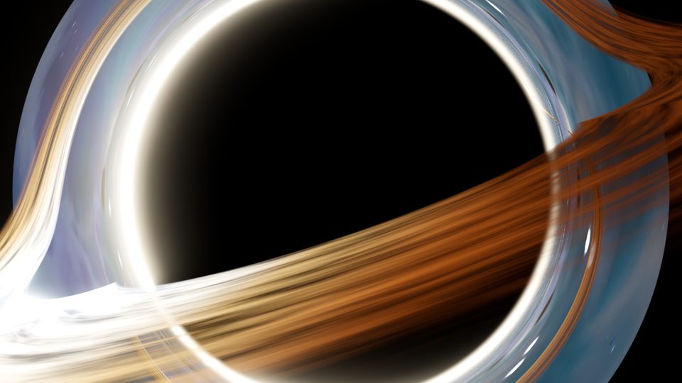 Its accretion disk bends the light of everything behind it.